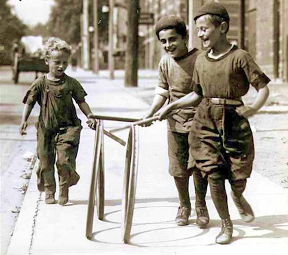 Boys Trundling Hoops